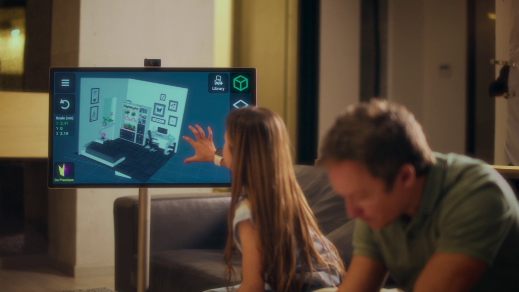 Niña usando Wandr con app de diseño 3D